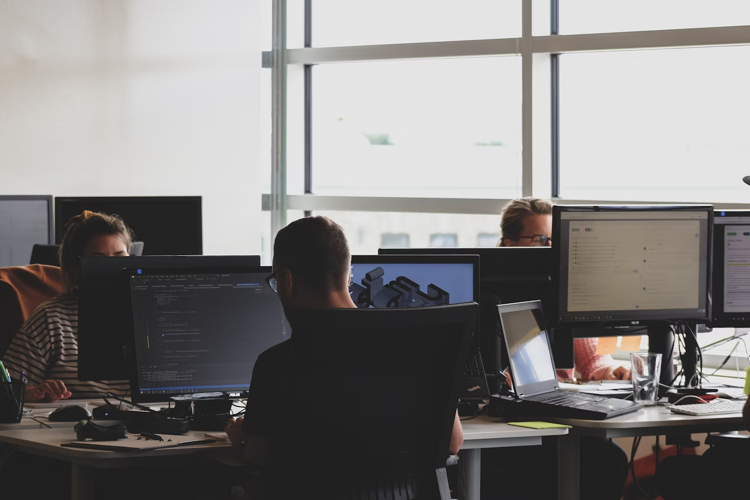 employees in an office - AI Application Development