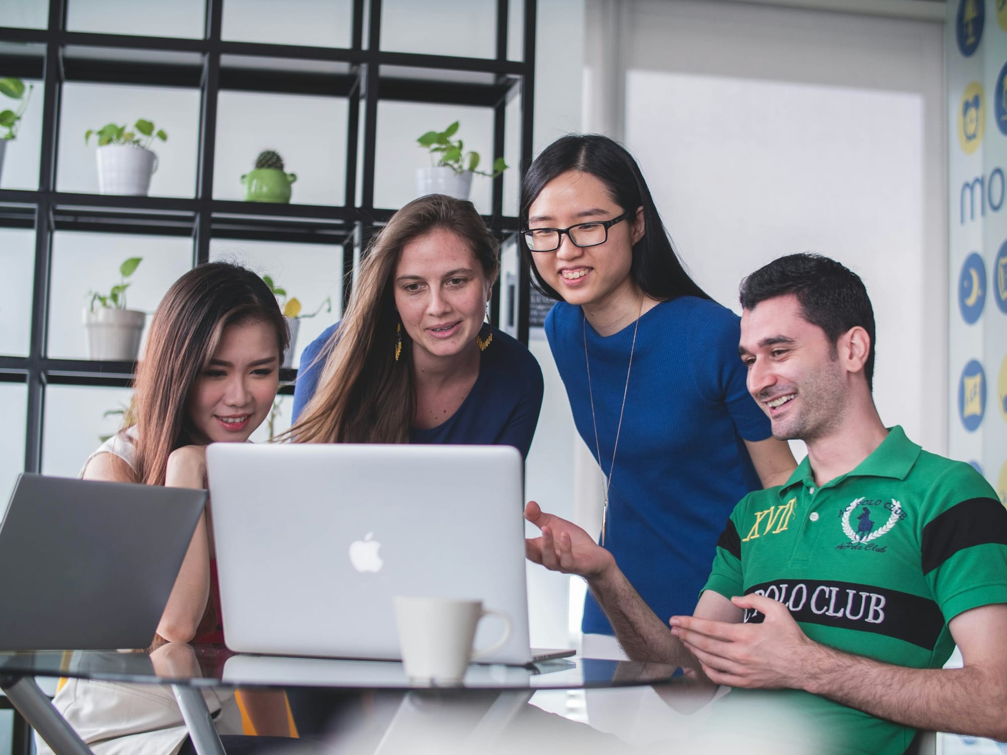 employees looking happy - AI Tech Stack