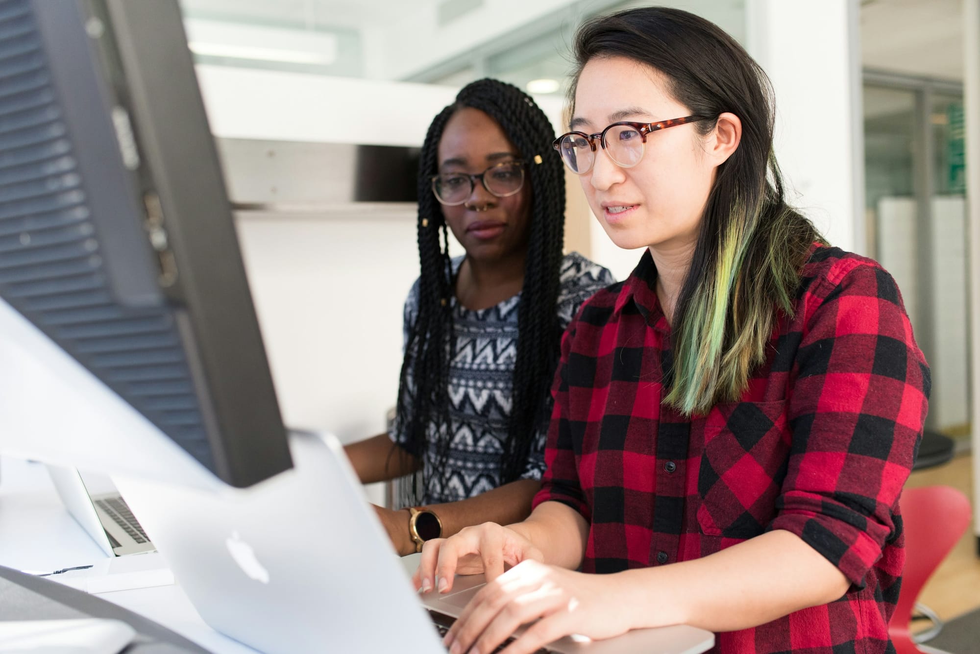 women on a desktop - Gen AI Architecture