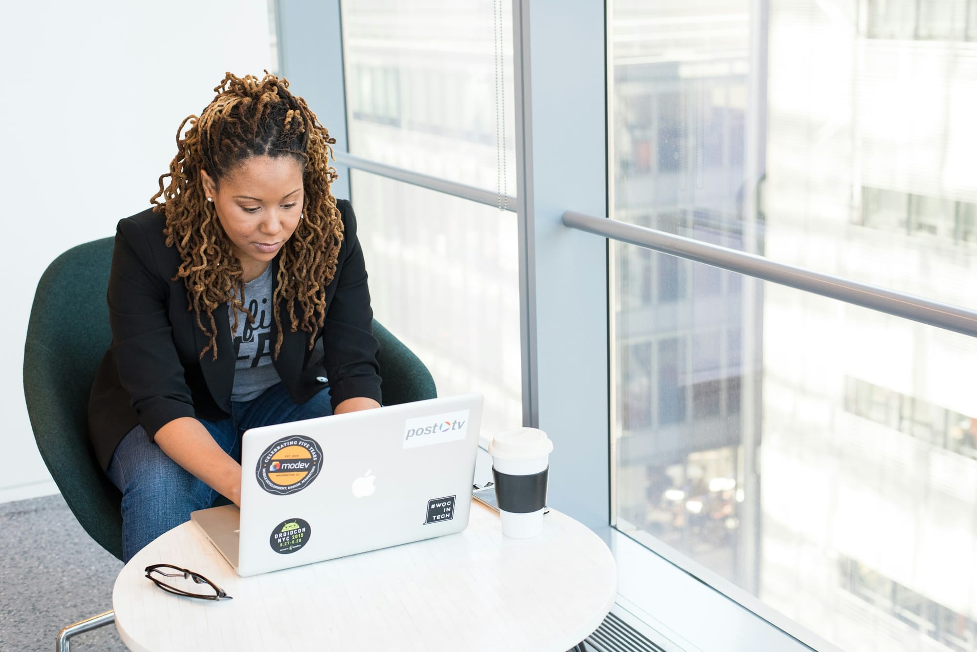 women on a laptop - Generative AI Development Services