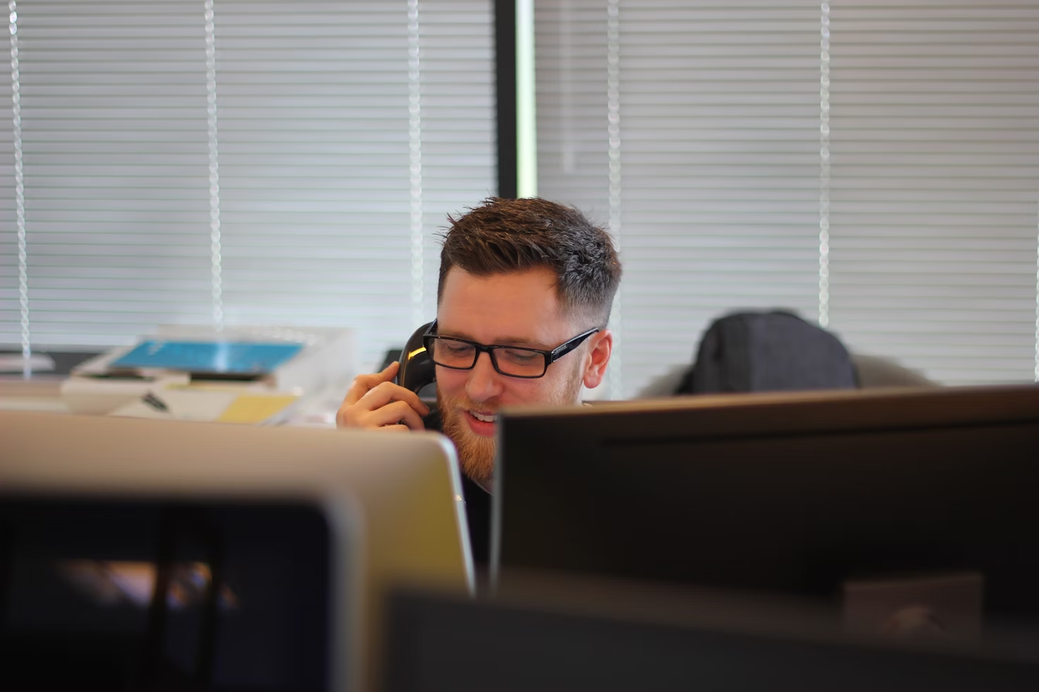 man on a call - Generative AI Customer Experience Strategy
