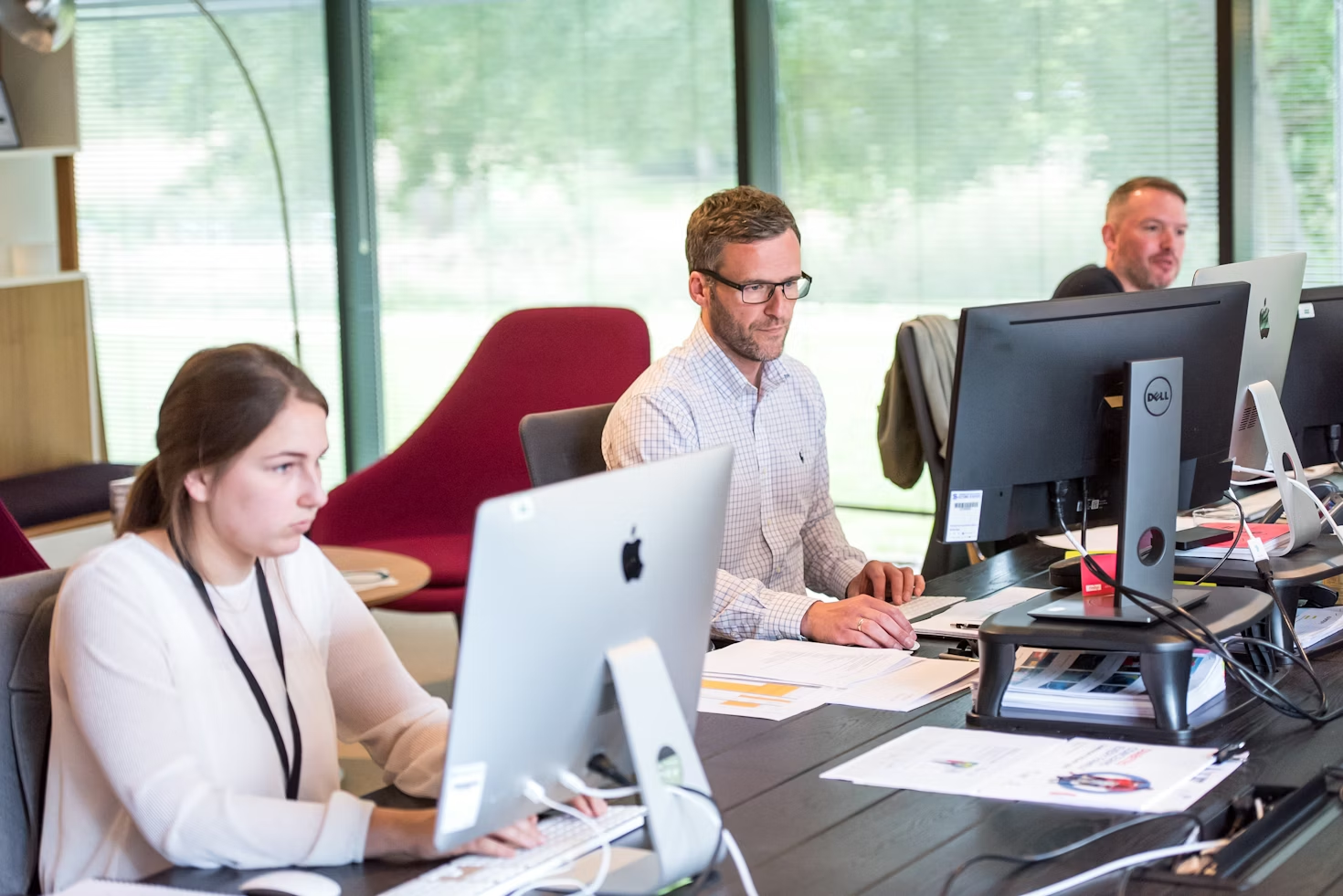 employees in an office - Generative AI Customer Experience Strategy