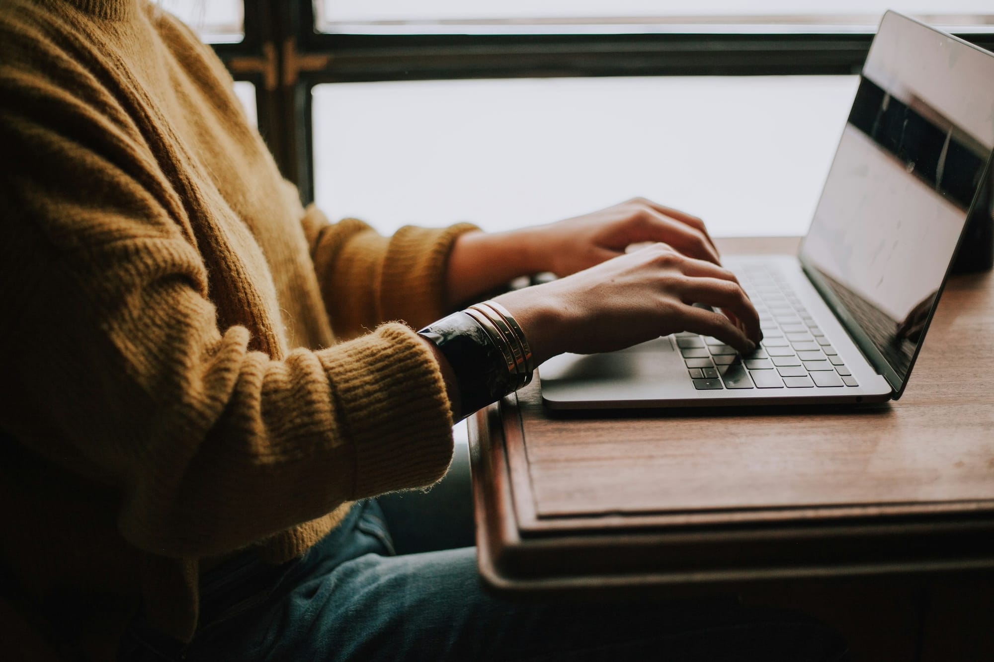 woman typing - Gemini Alternatives