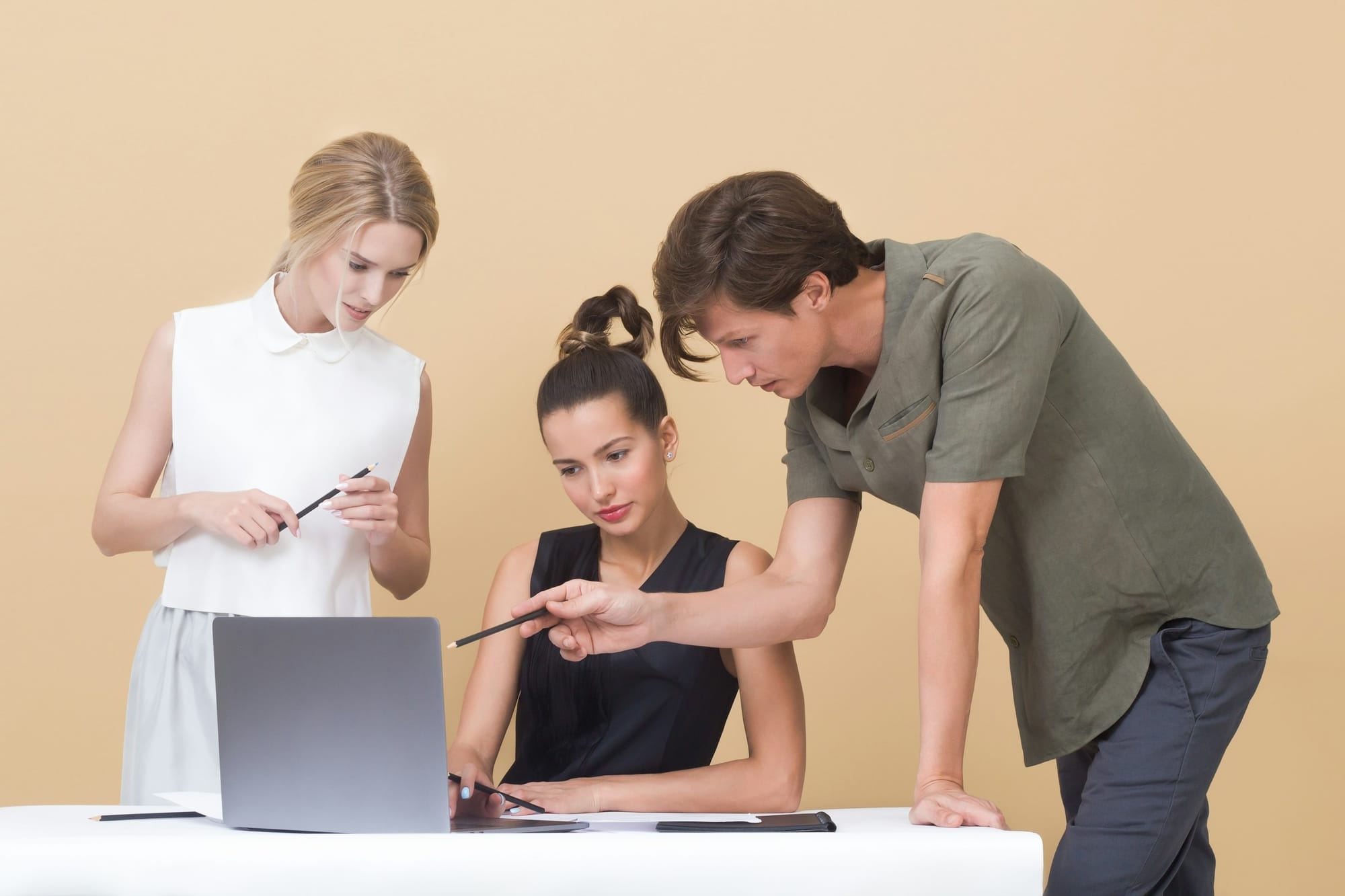 Man Pointing at Laptop - How to Fine Tune LLM