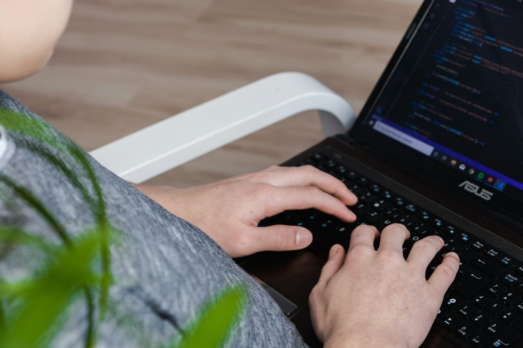 man typing on a laptop - Rapid Application Development Tools