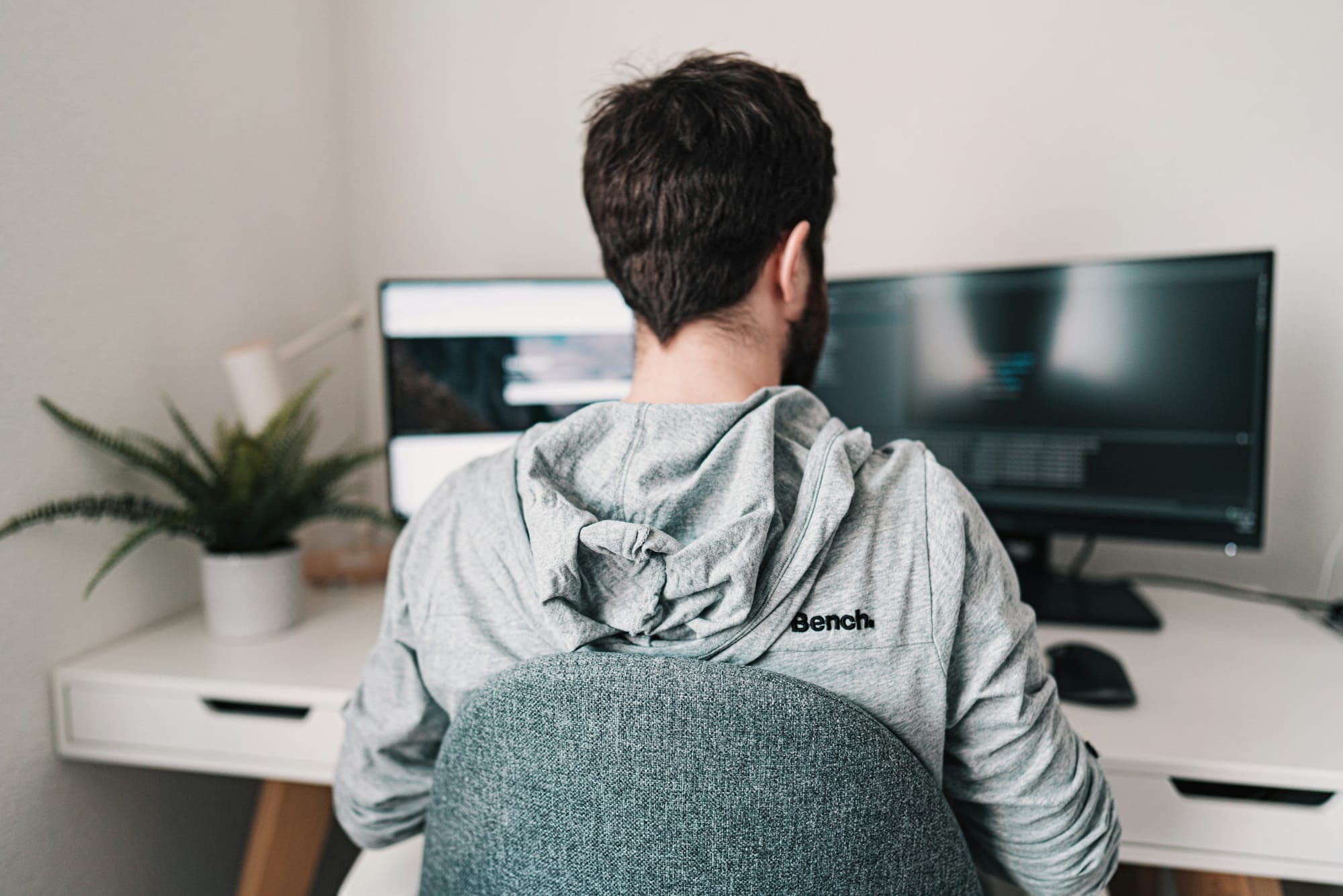 Person Coding on Laptop - AI Frameworks