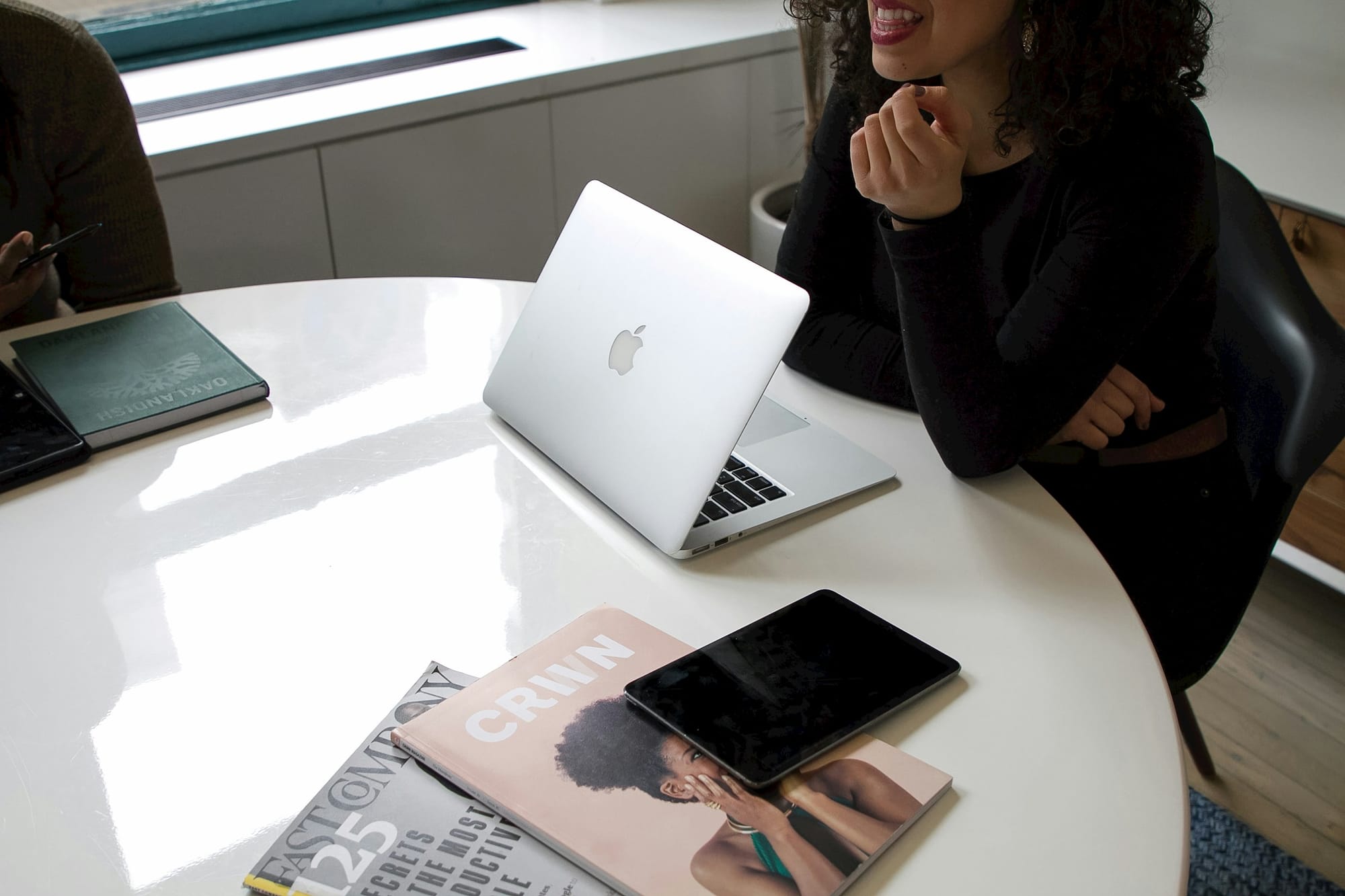 woman in a meeting for faster roll out - AI Development Platforms