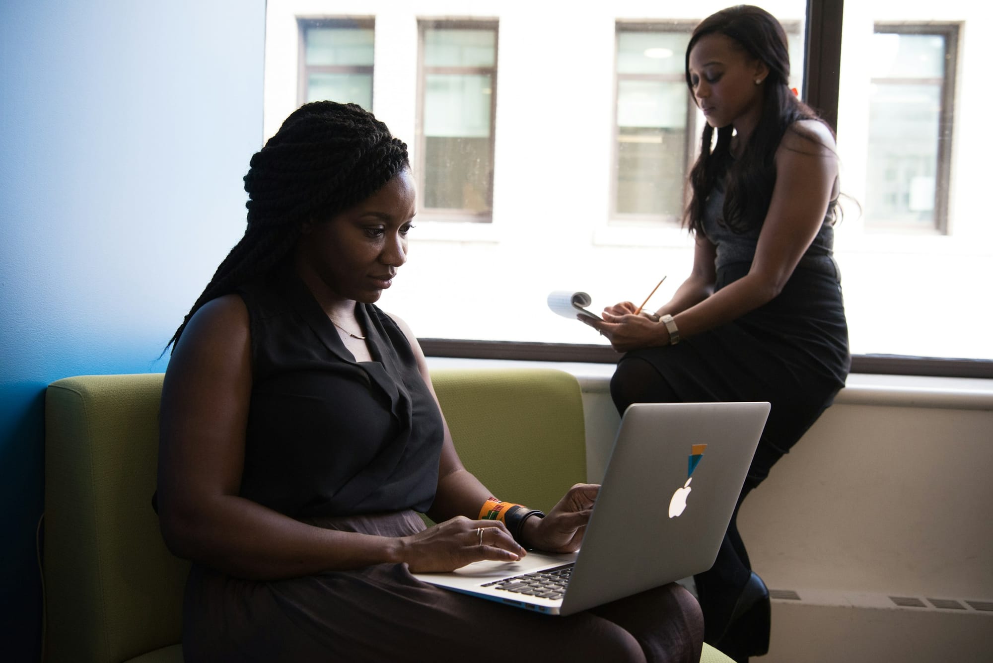 woman on a laptop - AI Integration Tools