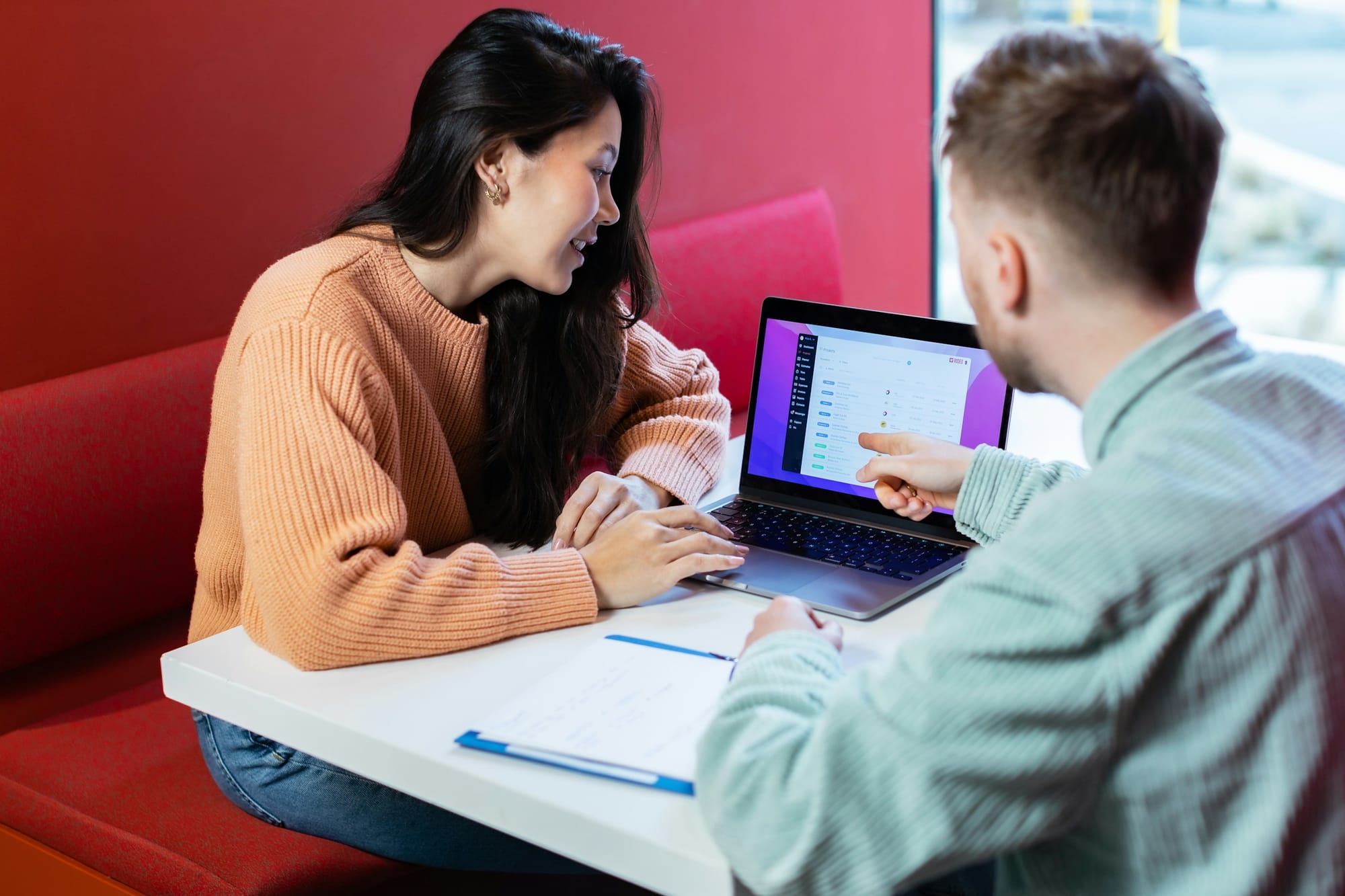 man and woman on a laptop - 