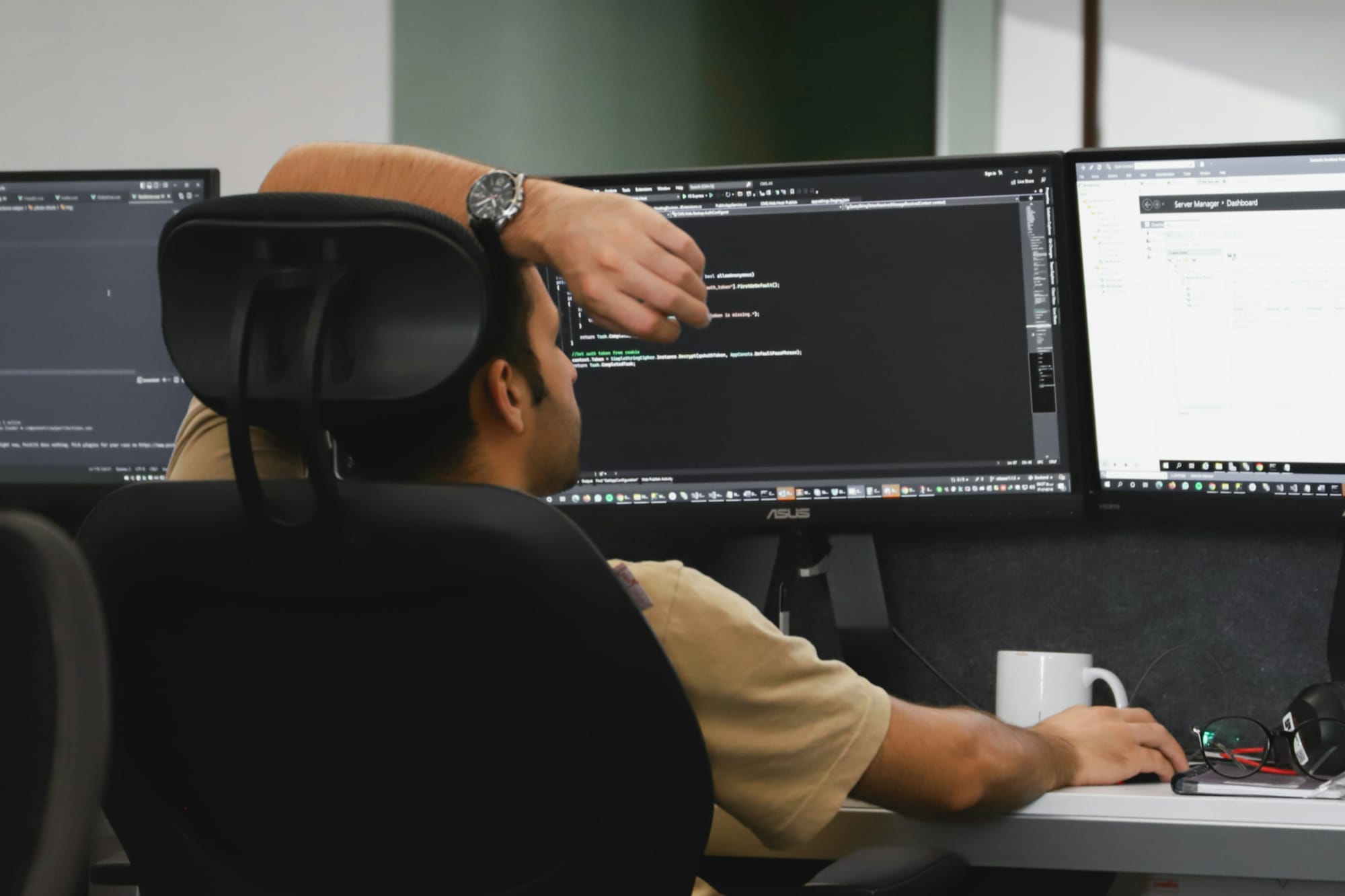 man on a desktop - UiPath Competitors